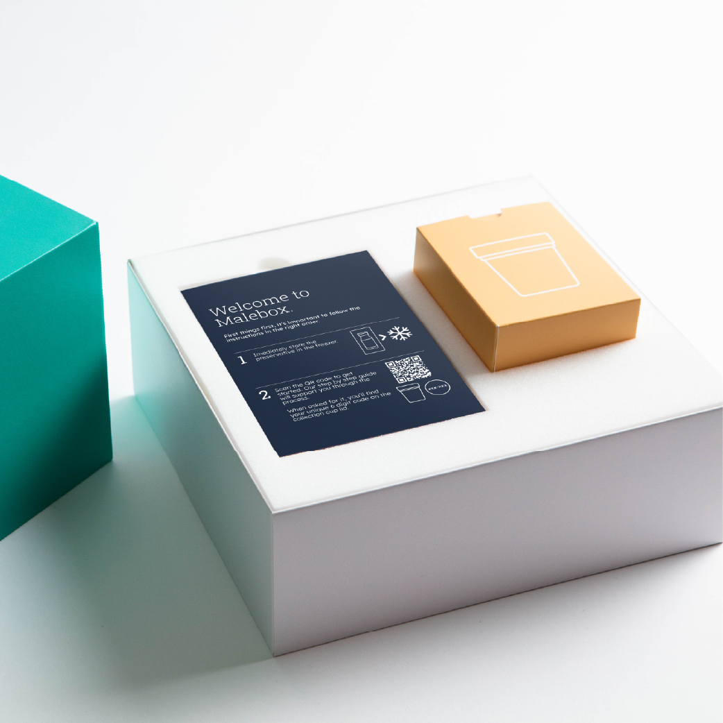 Product packaging with a card and a small box on a white surface